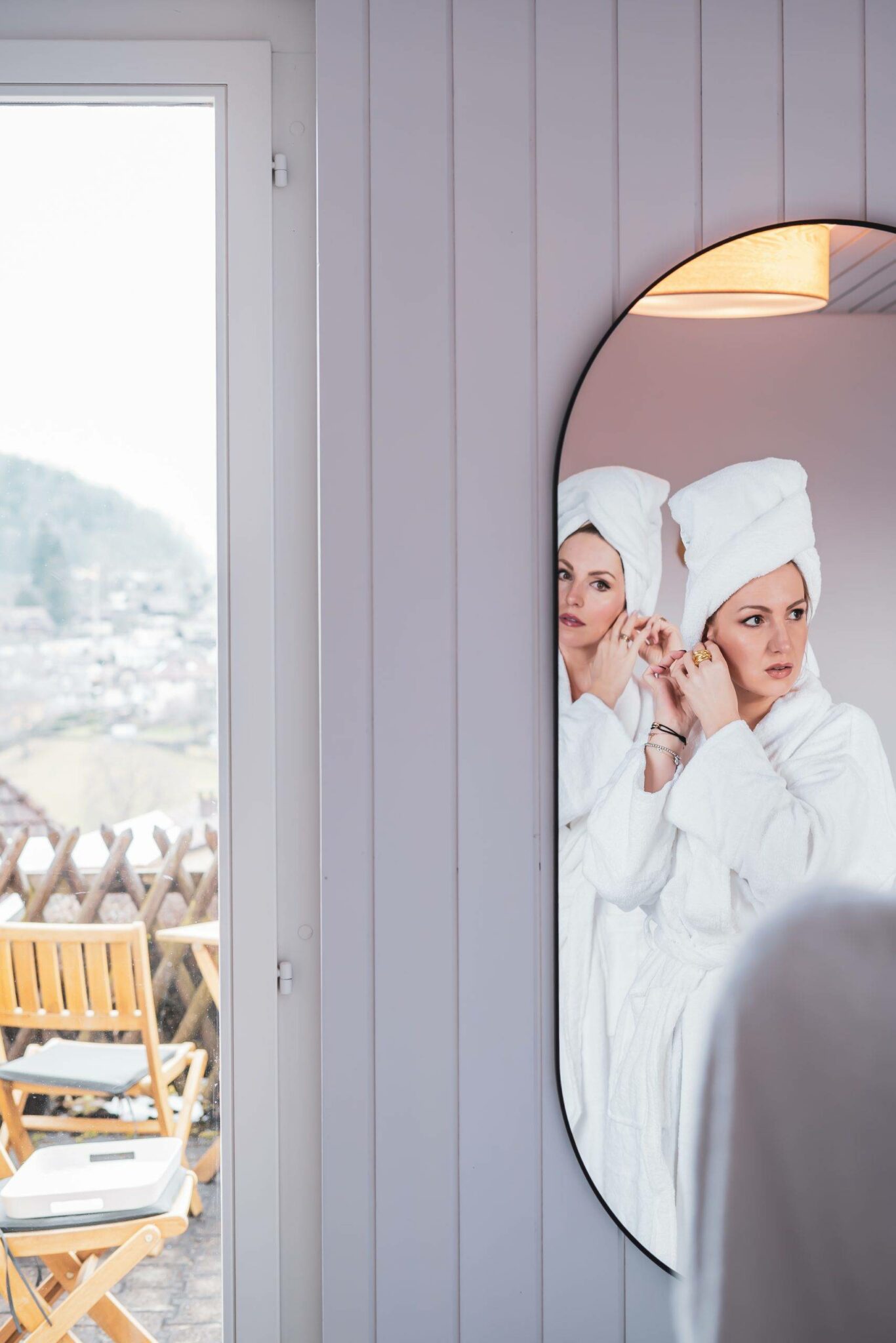 Models wearing a bathrobe, towel , sunglasses in hotel room in La Belle Vue Spiez hotel. Mirror Izabela Switon-Kulinska. AnnaSwissmermaid 