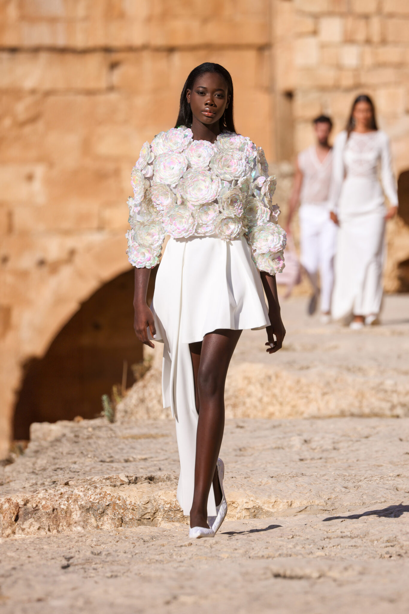 GODDESS OF LOVE Ready-To-Wear Spring 2024 When Fashion meets Heritage: Maison Georges Hobeika at Baalbek.